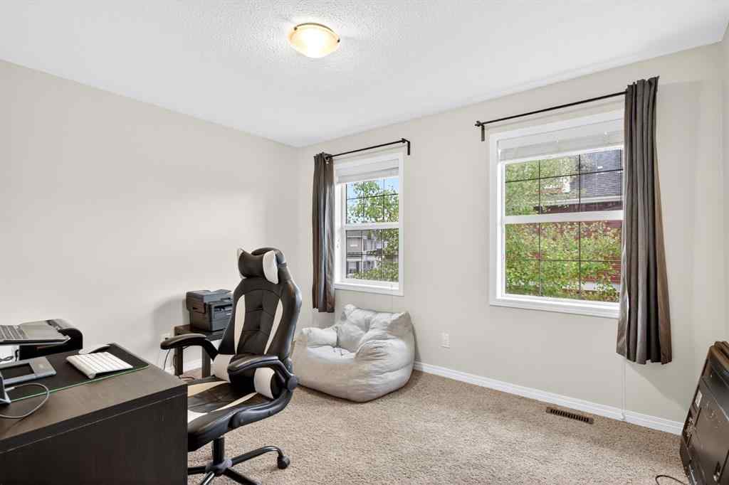 MLS® A2265456 - Unit #2002 1001 8 Street NW in Williamstown Airdrie, Residential