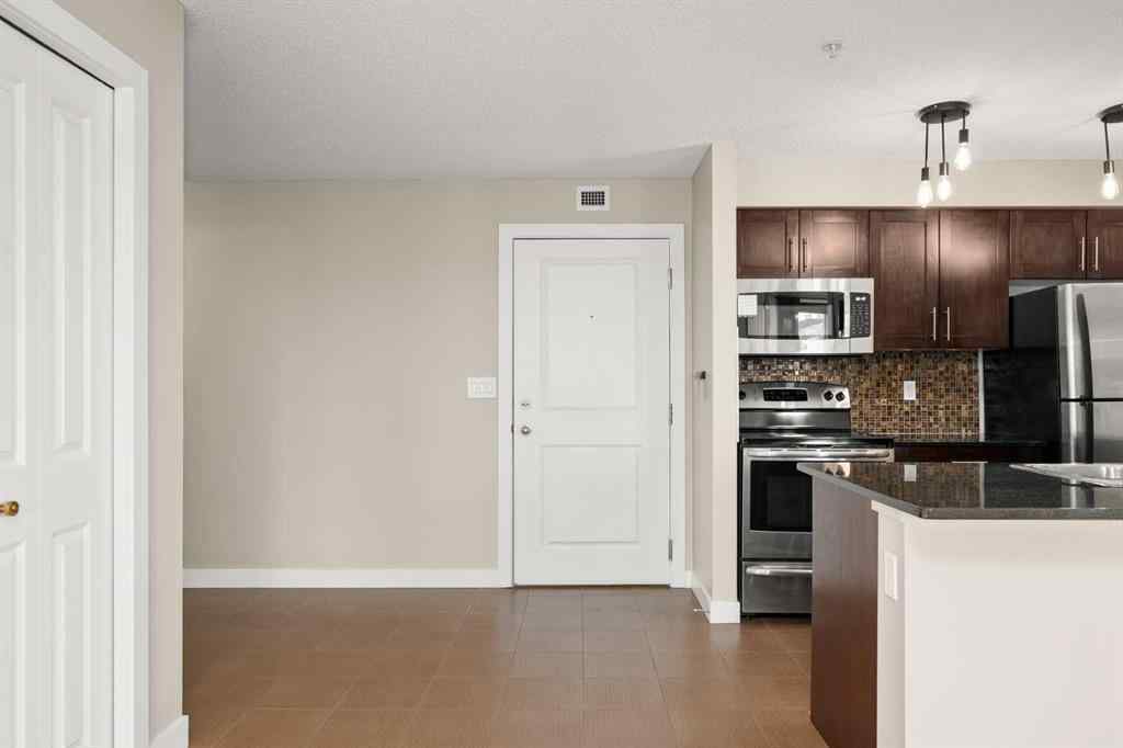 MLS® A2265462 - Unit #3309 403 Mackenzie Way SW in Downtown Airdrie, Residential