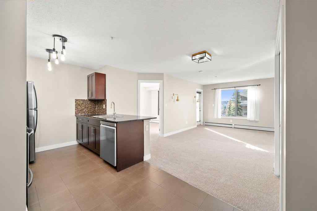 MLS® A2265462 - Unit #3309 403 Mackenzie Way SW in Downtown Airdrie, Residential