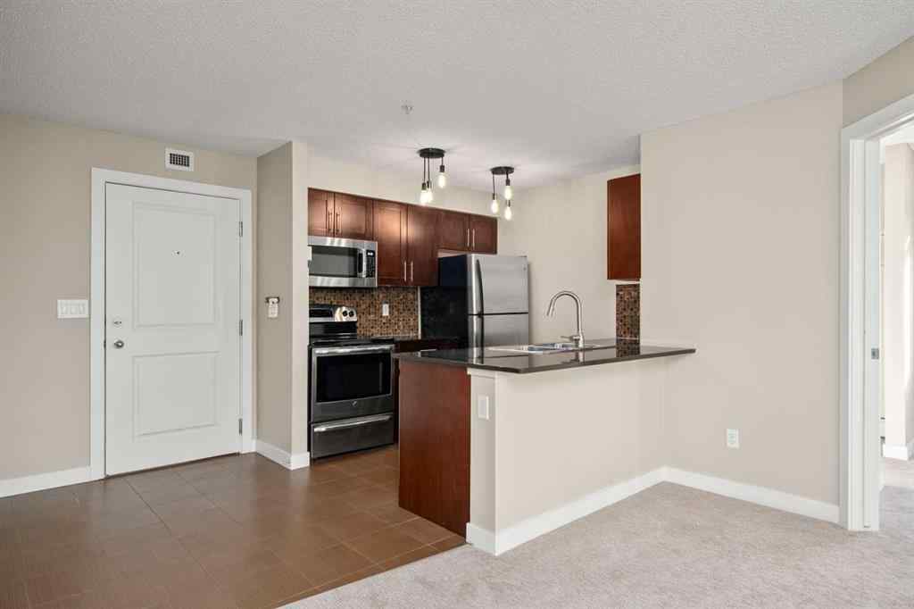 MLS® A2265462 - Unit #3309 403 Mackenzie Way SW in Downtown Airdrie, Residential