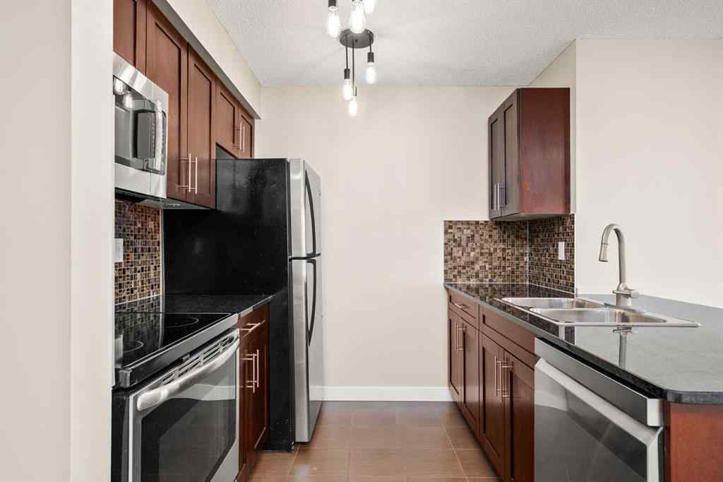 MLS® A2265462 - Unit #3309 403 Mackenzie Way SW in Downtown Airdrie, Residential