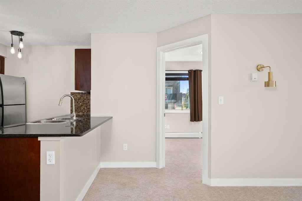 MLS® A2265462 - Unit #3309 403 Mackenzie Way SW in Downtown Airdrie, Residential