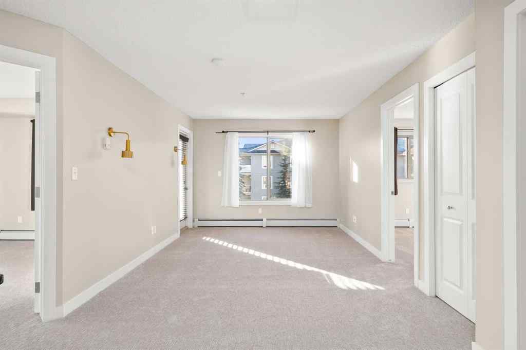 MLS® A2265462 - Unit #3309 403 Mackenzie Way SW in Downtown Airdrie, Residential