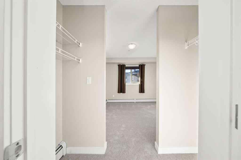 MLS® A2265462 - Unit #3309 403 Mackenzie Way SW in Downtown Airdrie, Residential