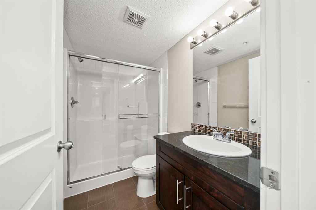 MLS® A2265462 - Unit #3309 403 Mackenzie Way SW in Downtown Airdrie, Residential