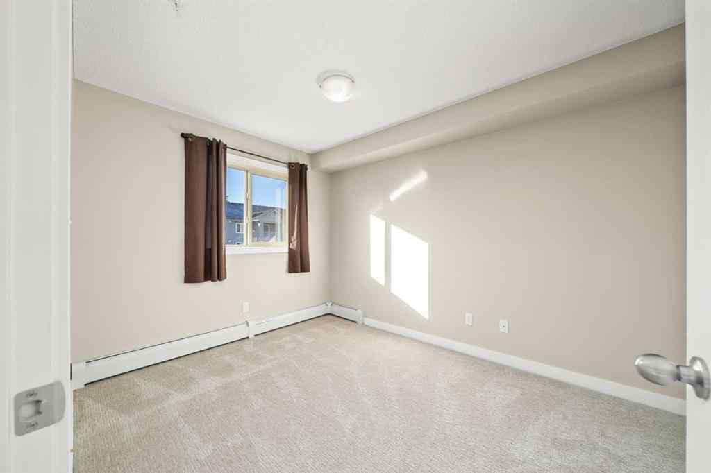 MLS® A2265462 - Unit #3309 403 Mackenzie Way SW in Downtown Airdrie, Residential