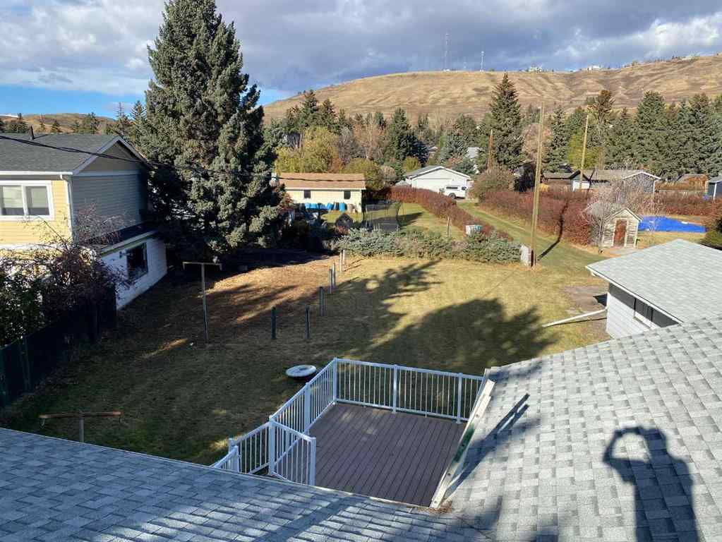 MLS® A2265474 - 408 First Street E in East End Cochrane, Residential