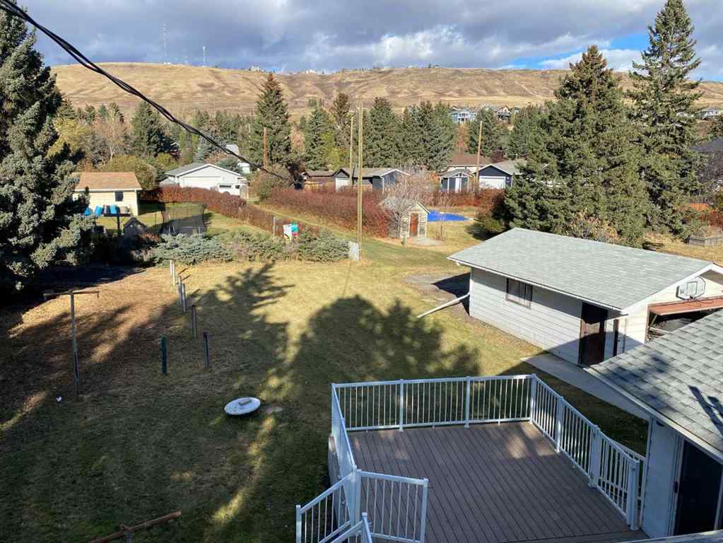 MLS® A2265474 - 408 First Street E in East End Cochrane, Residential