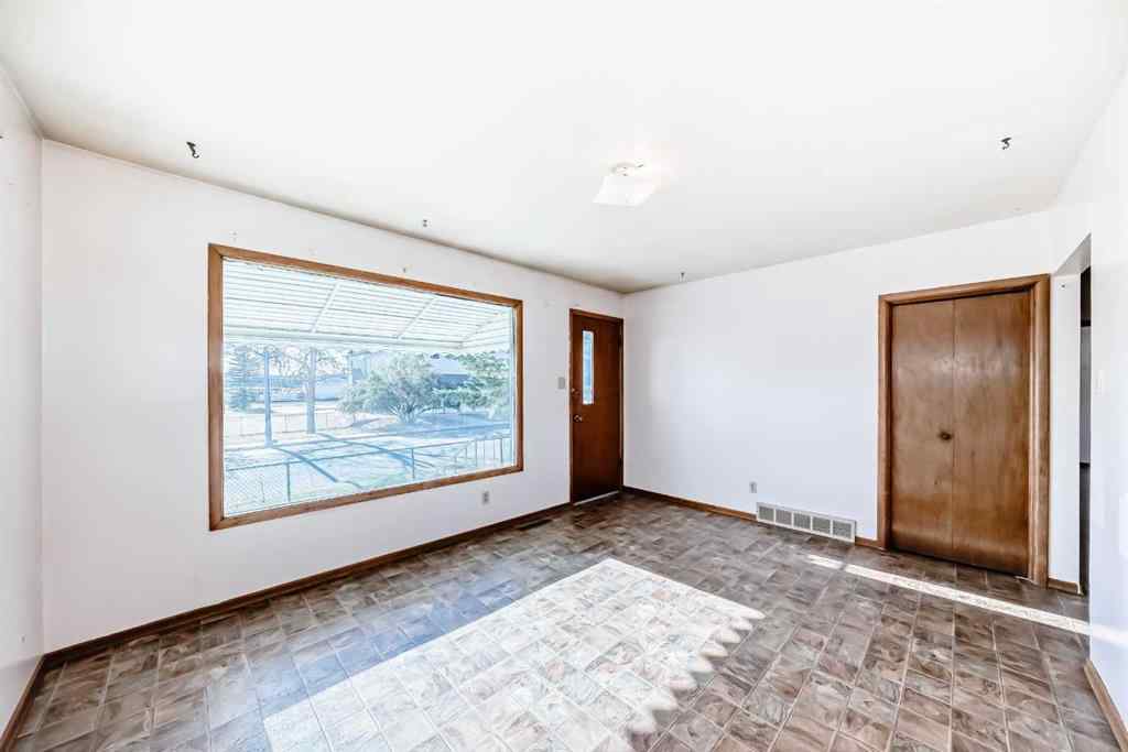 MLS® A2265474 - 408 First Street E in East End Cochrane, Residential