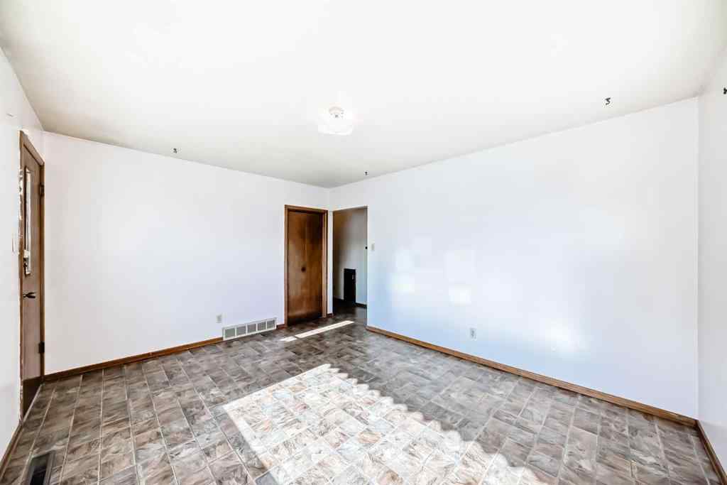 MLS® A2265474 - 408 First Street E in East End Cochrane, Residential