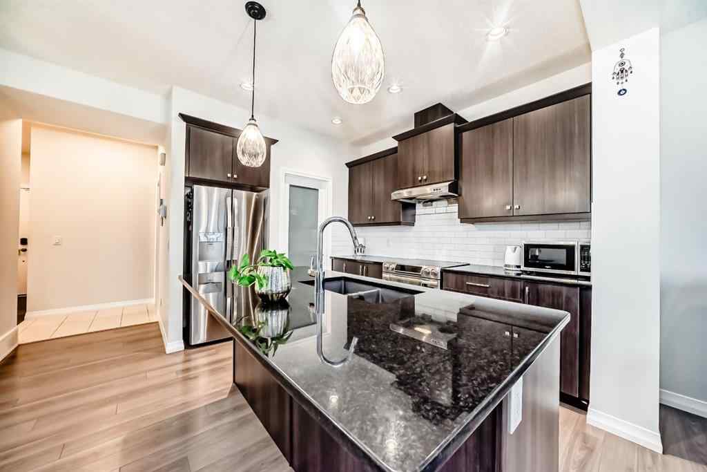MLS® A2265476 - 163 Evanscrest Way NW in Evanston Calgary, Residential