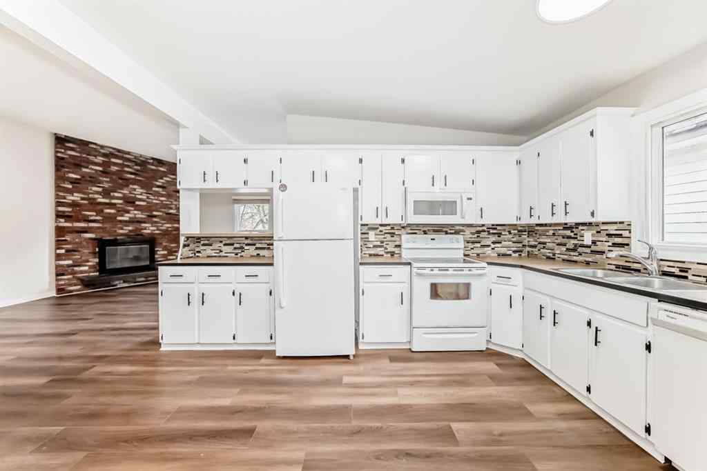 MLS® A2265483 - 6525 & 6527 58 Street NW in Dalhousie Calgary, Multi-Family