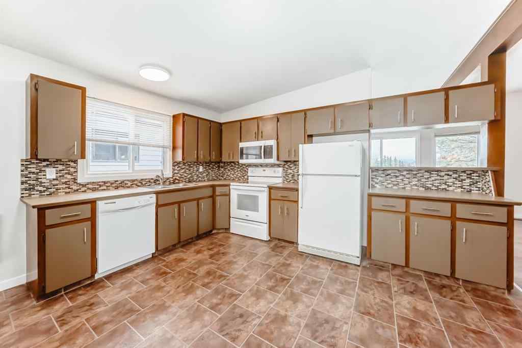 MLS® A2265483 - 6525 & 6527 58 Street NW in Dalhousie Calgary, Multi-Family