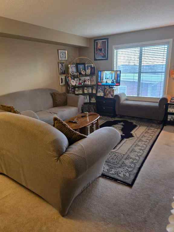 MLS® A2265505 - Unit #214 5 Saddlestone Way NE in Saddle Ridge Calgary, Residential