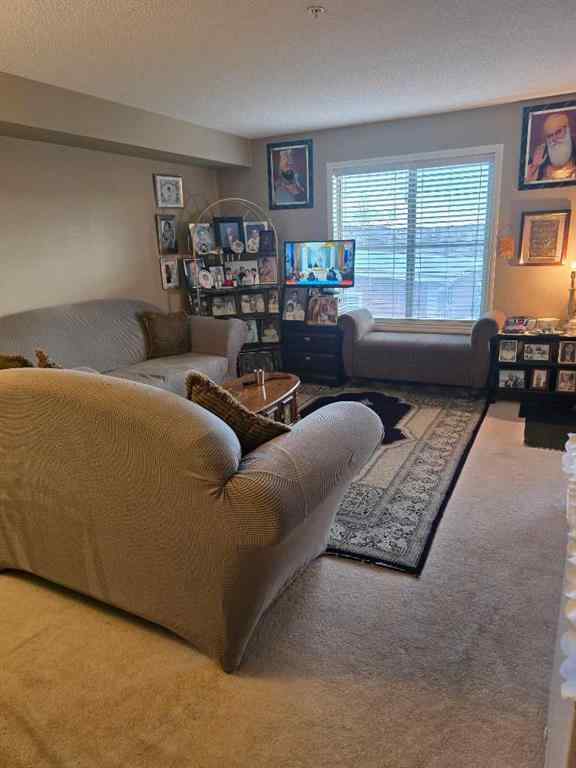 MLS® A2265505 - Unit #214 5 Saddlestone Way NE in Saddle Ridge Calgary, Residential