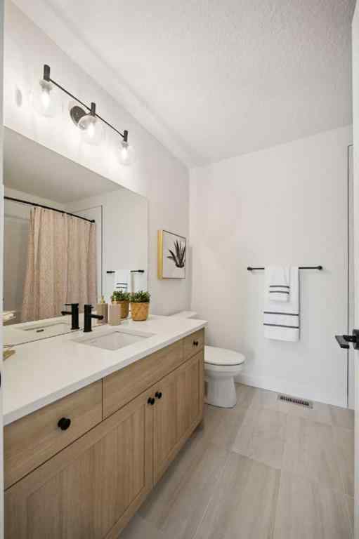 MLS® A2265512 - 209 Southbow Drive  in Southbow Landing Cochrane, Residential