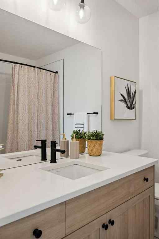 MLS® A2265512 - 209 Southbow Drive  in Southbow Landing Cochrane, Residential