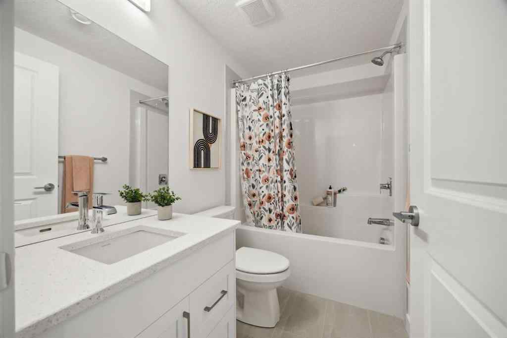 MLS® A2265512 - 209 Southbow Drive  in Southbow Landing Cochrane, Residential