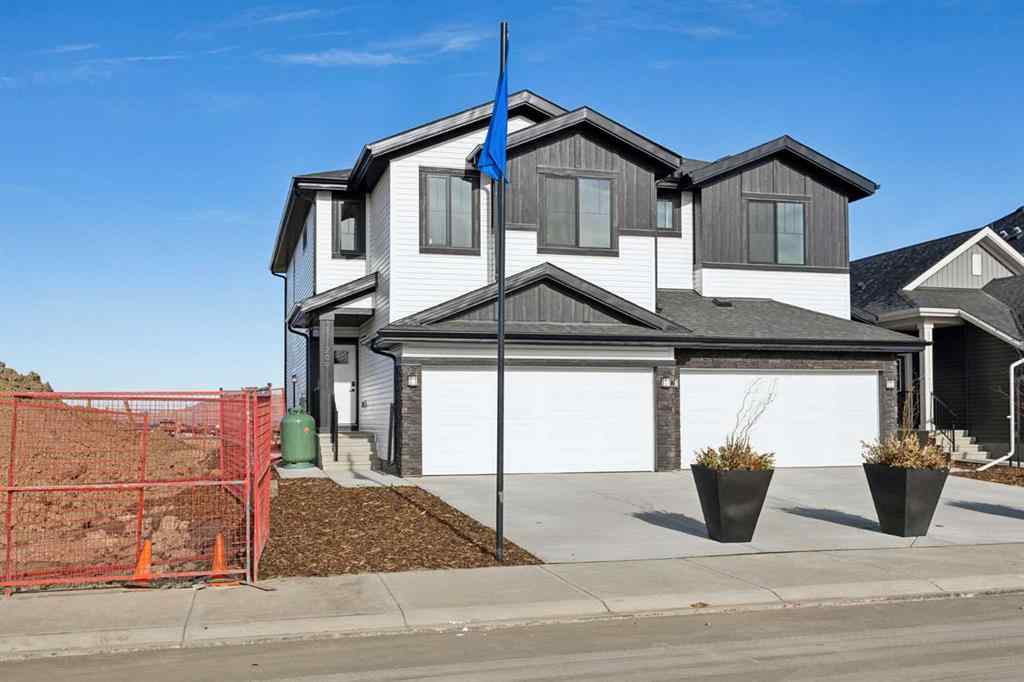 MLS® A2265512 - 209 Southbow Drive  in Southbow Landing Cochrane, Residential