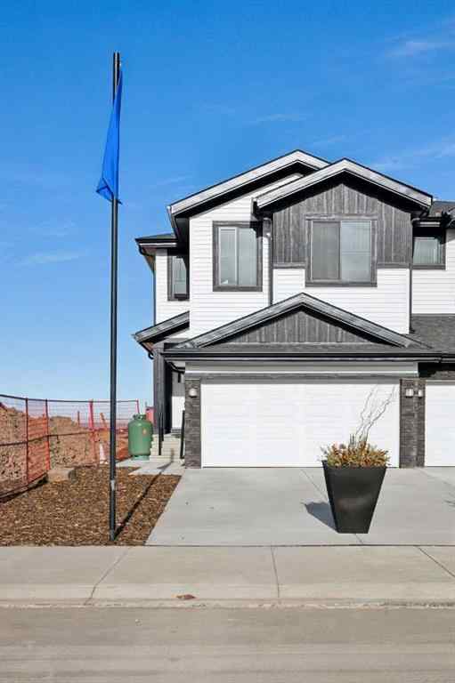 MLS® A2265512 - 209 Southbow Drive  in Southbow Landing Cochrane, Residential