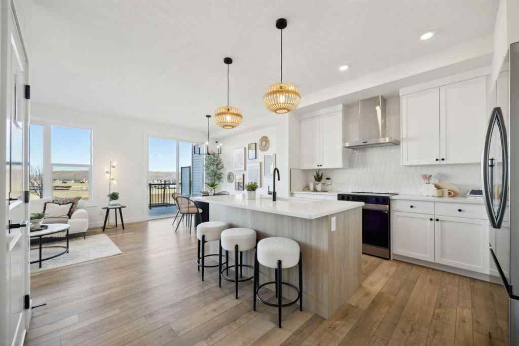 MLS® A2265512 - 209 Southbow Drive  in Southbow Landing Cochrane, Residential