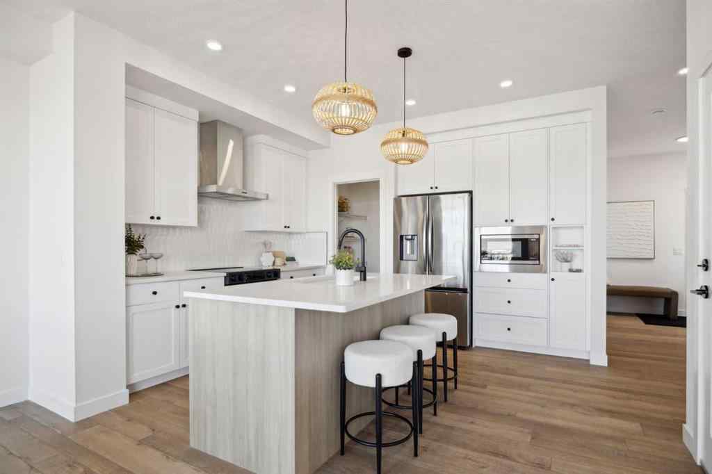 MLS® A2265512 - 209 Southbow Drive  in Southbow Landing Cochrane, Residential