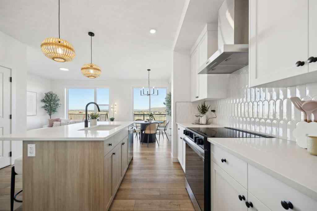 MLS® A2265512 - 209 Southbow Drive  in Southbow Landing Cochrane, Residential