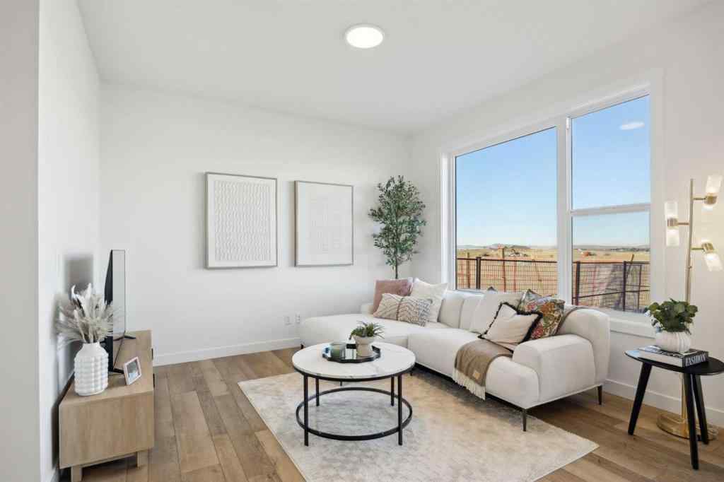 MLS® A2265512 - 209 Southbow Drive  in Southbow Landing Cochrane, Residential