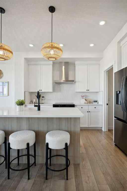 MLS® A2265512 - 209 Southbow Drive  in Southbow Landing Cochrane, Residential