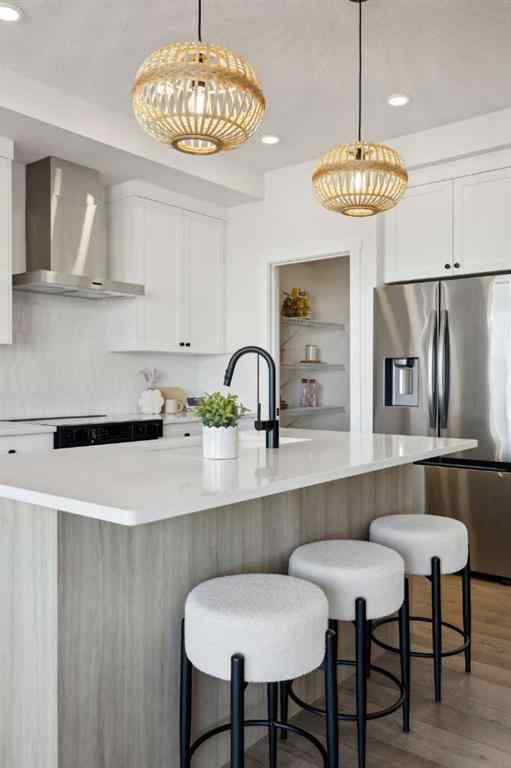 MLS® A2265512 - 209 Southbow Drive  in Southbow Landing Cochrane, Residential