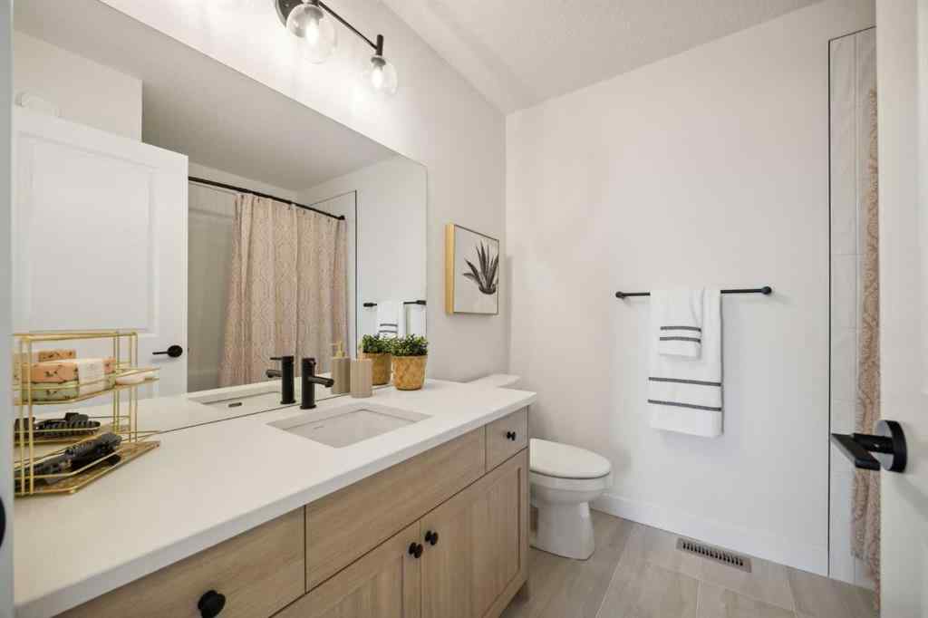 MLS® A2265512 - 209 Southbow Drive  in Southbow Landing Cochrane, Residential