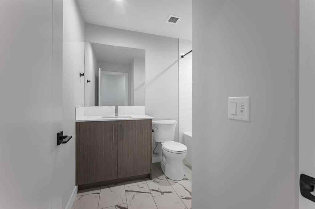 MLS® A2265516 - Unit #308 110 18A Street NW in West Hillhurst Calgary, Residential