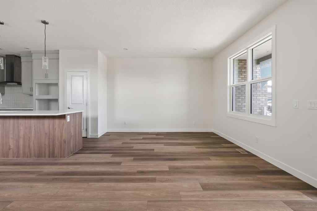 MLS® A2265521 - 10 Herron Common NE in Livingston Calgary, Residential