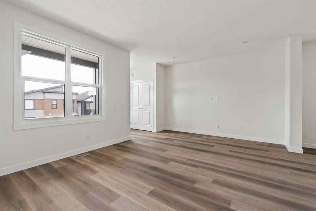 MLS® A2265521 - 10 Herron Common NE in Livingston Calgary, Residential