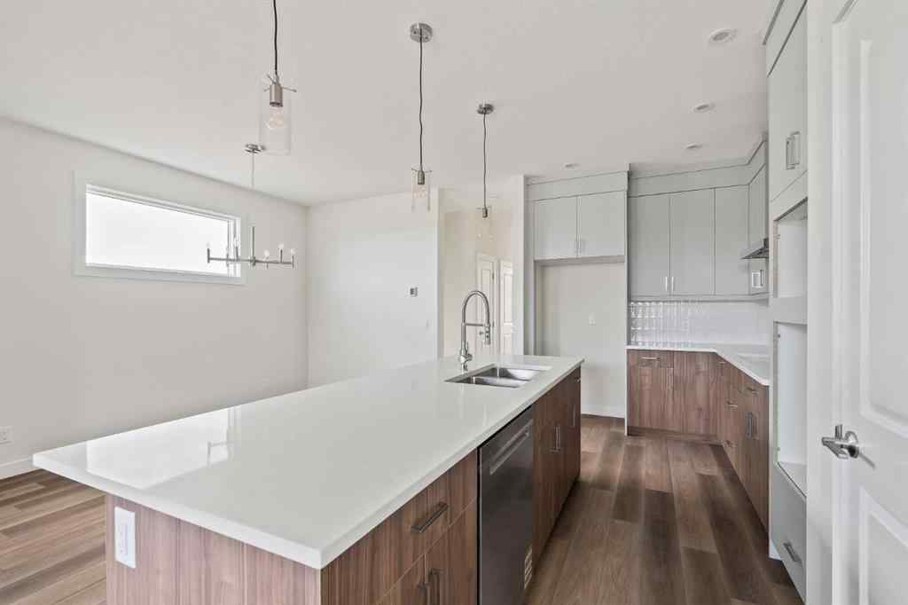 MLS® A2265521 - 10 Herron Common NE in Livingston Calgary, Residential