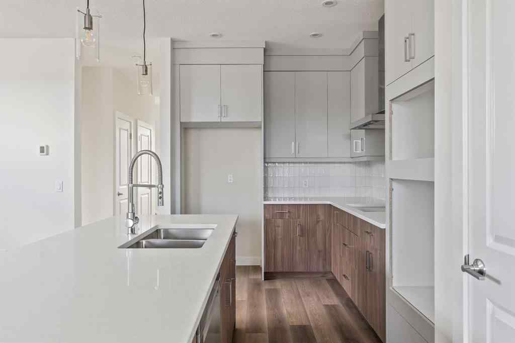 MLS® A2265521 - 10 Herron Common NE in Livingston Calgary, Residential