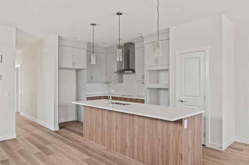 MLS® A2265521 - 10 Herron Common NE in Livingston Calgary, Residential