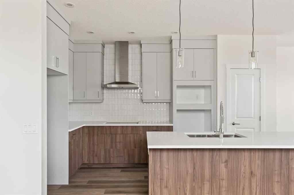 MLS® A2265521 - 10 Herron Common NE in Livingston Calgary, Residential