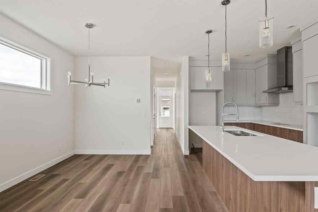 MLS® A2265521 - 10 Herron Common NE in Livingston Calgary, Residential