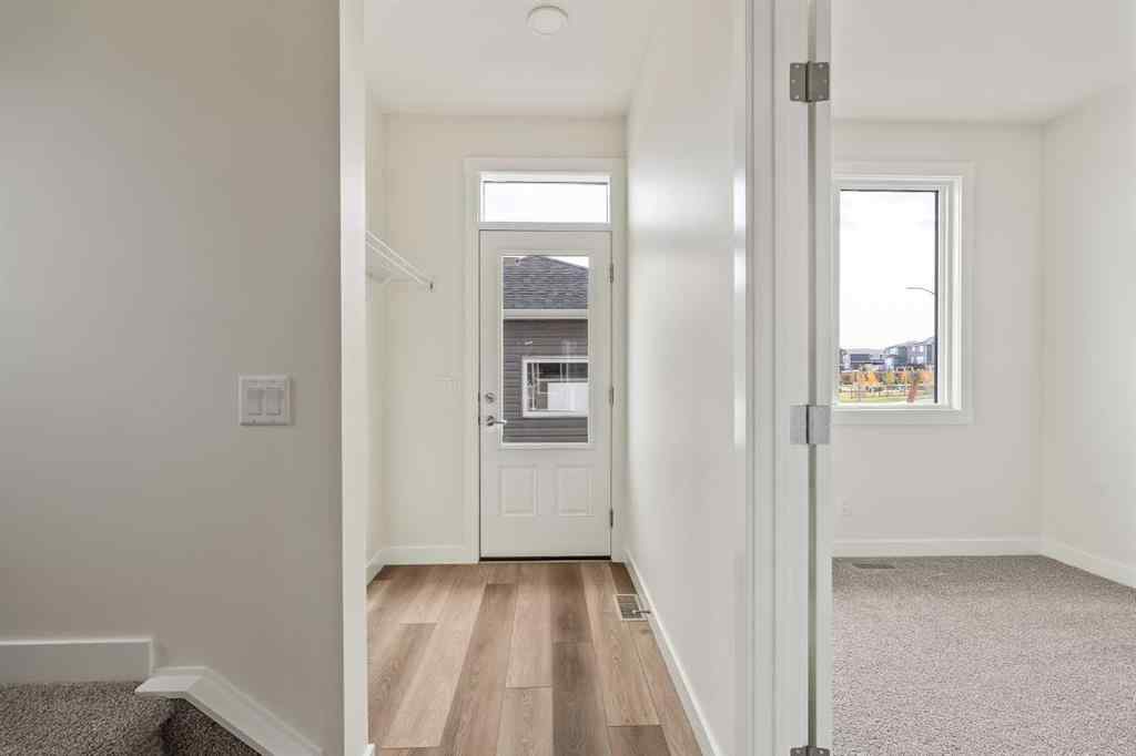 MLS® A2265521 - 10 Herron Common NE in Livingston Calgary, Residential