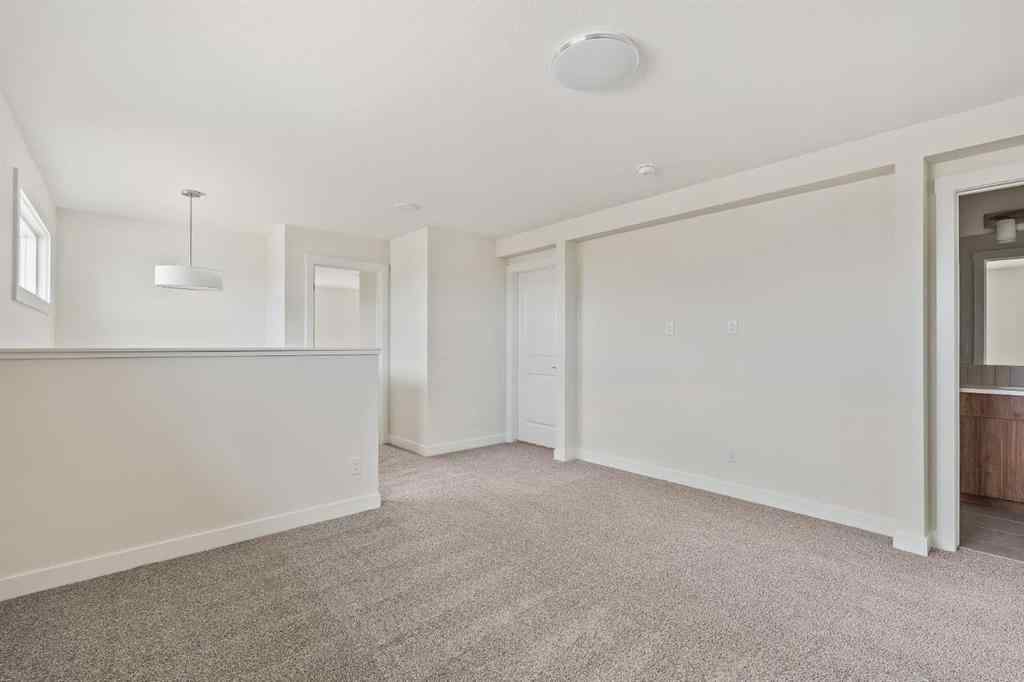 MLS® A2265521 - 10 Herron Common NE in Livingston Calgary, Residential