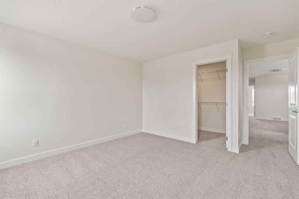 MLS® A2265521 - 10 Herron Common NE in Livingston Calgary, Residential