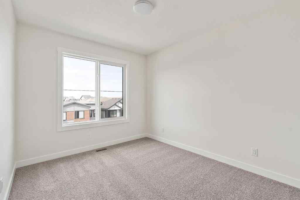 MLS® A2265521 - 10 Herron Common NE in Livingston Calgary, Residential