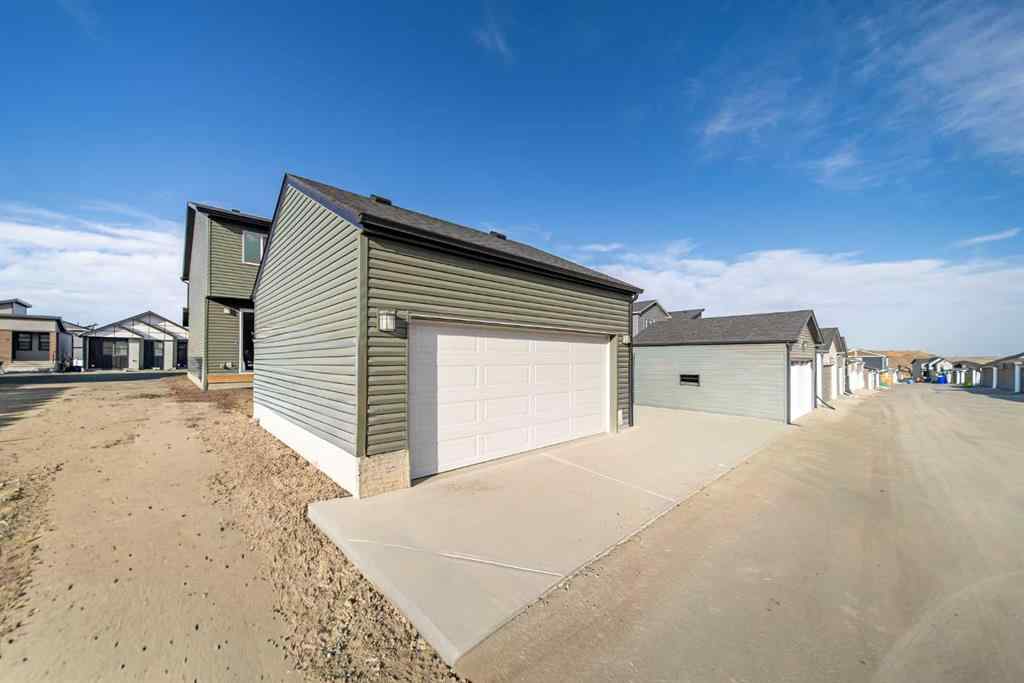 MLS&reg; # A2265522 - 22 Herron Common NE in Livingston Calgary, Residential Open Houses