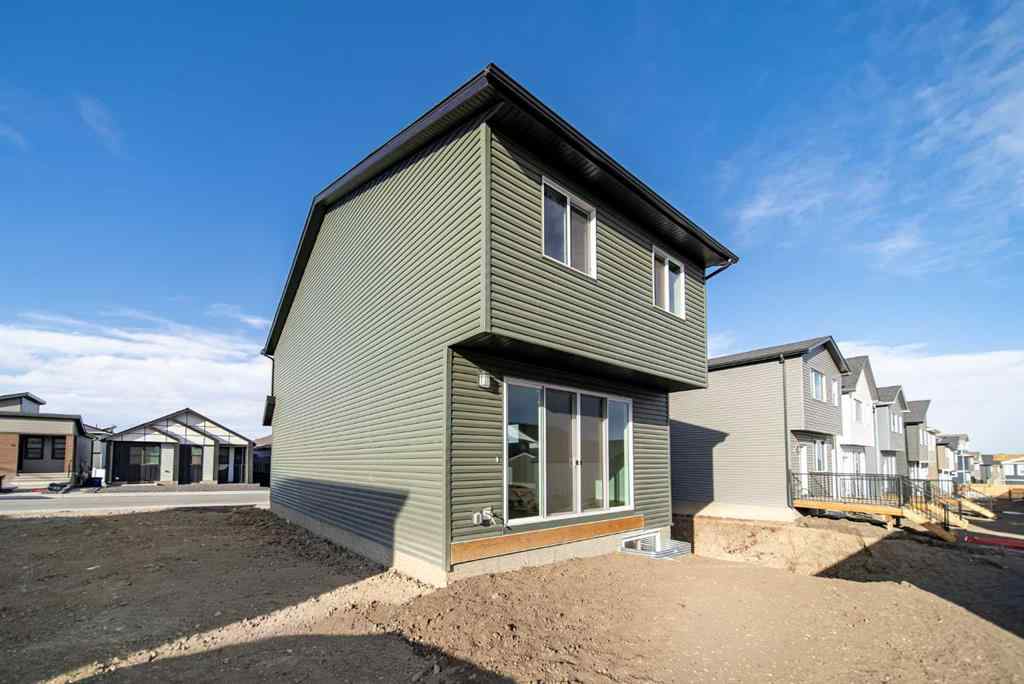 MLS&reg; # A2265522 - 22 Herron Common NE in Livingston Calgary, Residential Open Houses