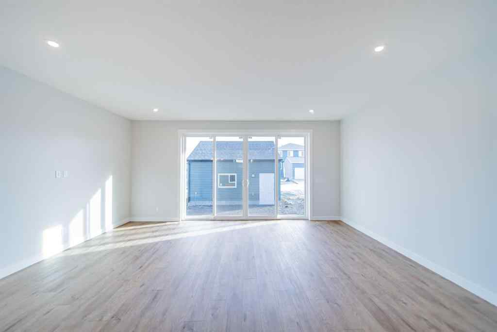 MLS&reg; # A2265522 - 22 Herron Common NE in Livingston Calgary, Residential Open Houses