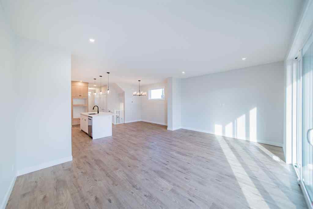 MLS&reg; # A2265522 - 22 Herron Common NE in Livingston Calgary, Residential Open Houses