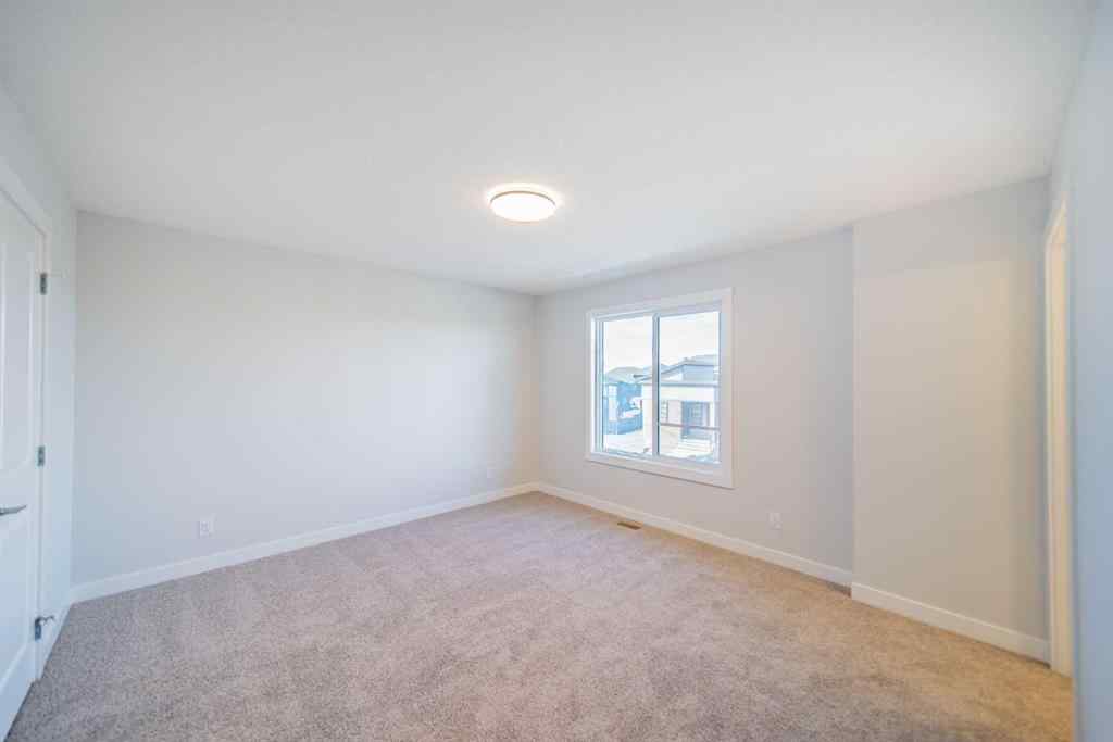 MLS&reg; # A2265522 - 22 Herron Common NE in Livingston Calgary, Residential Open Houses