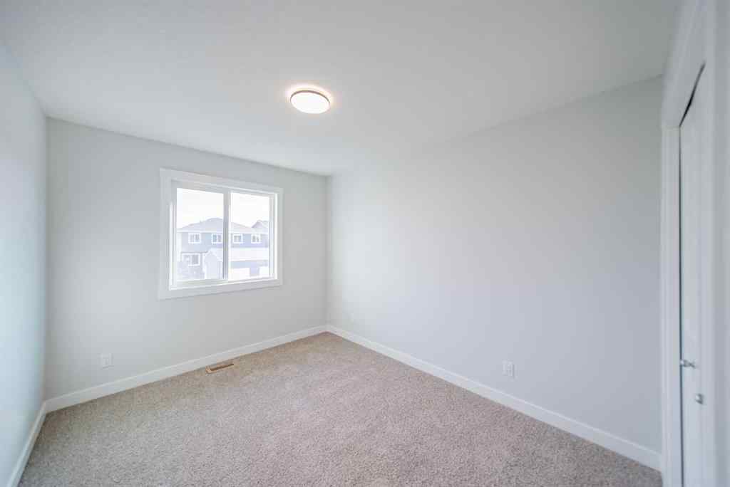 MLS&reg; # A2265522 - 22 Herron Common NE in Livingston Calgary, Residential Open Houses