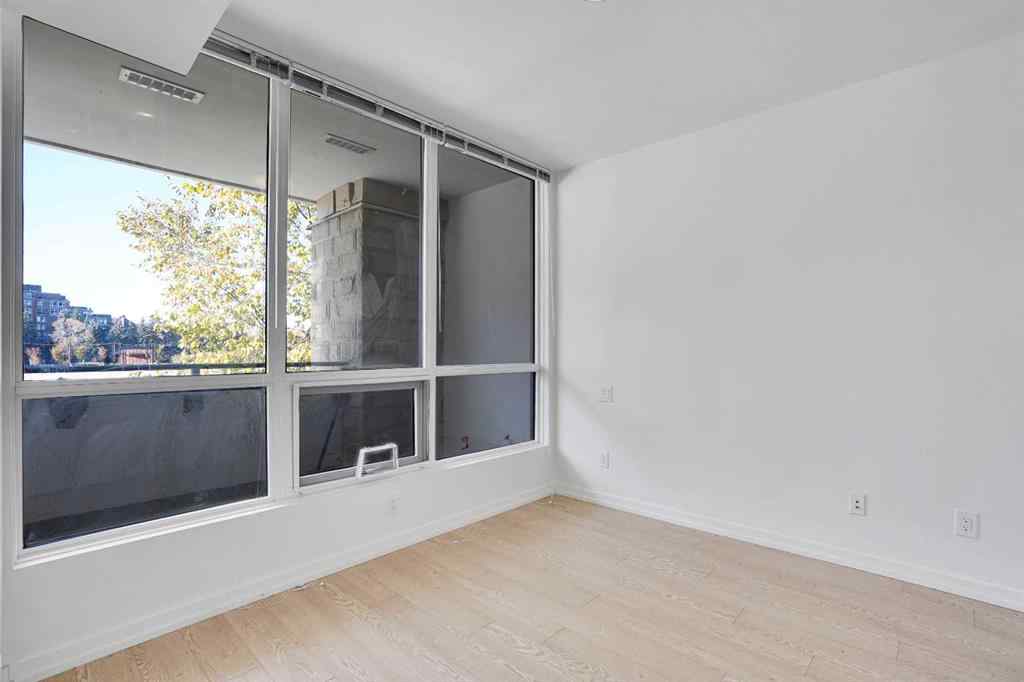 MLS® A2265532 - Unit #205 128 2 Street SW in Chinatown Calgary, Residential